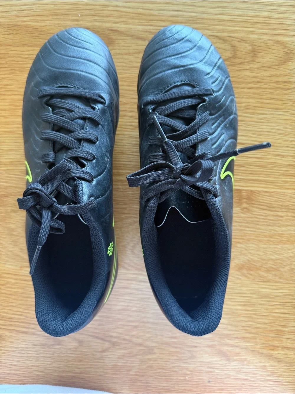 Nike Kids Black Soccer Cleats with Neon Yellow Swoosh